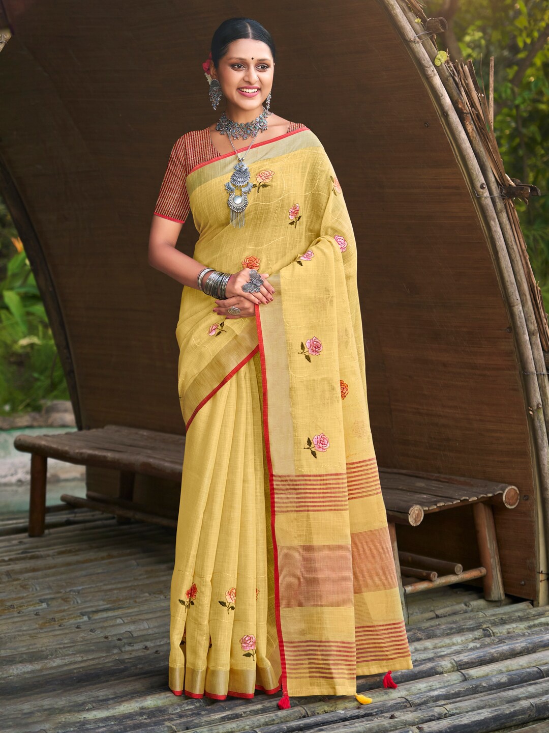 

Mitera Yellow Floral Embroidered Zari Saree