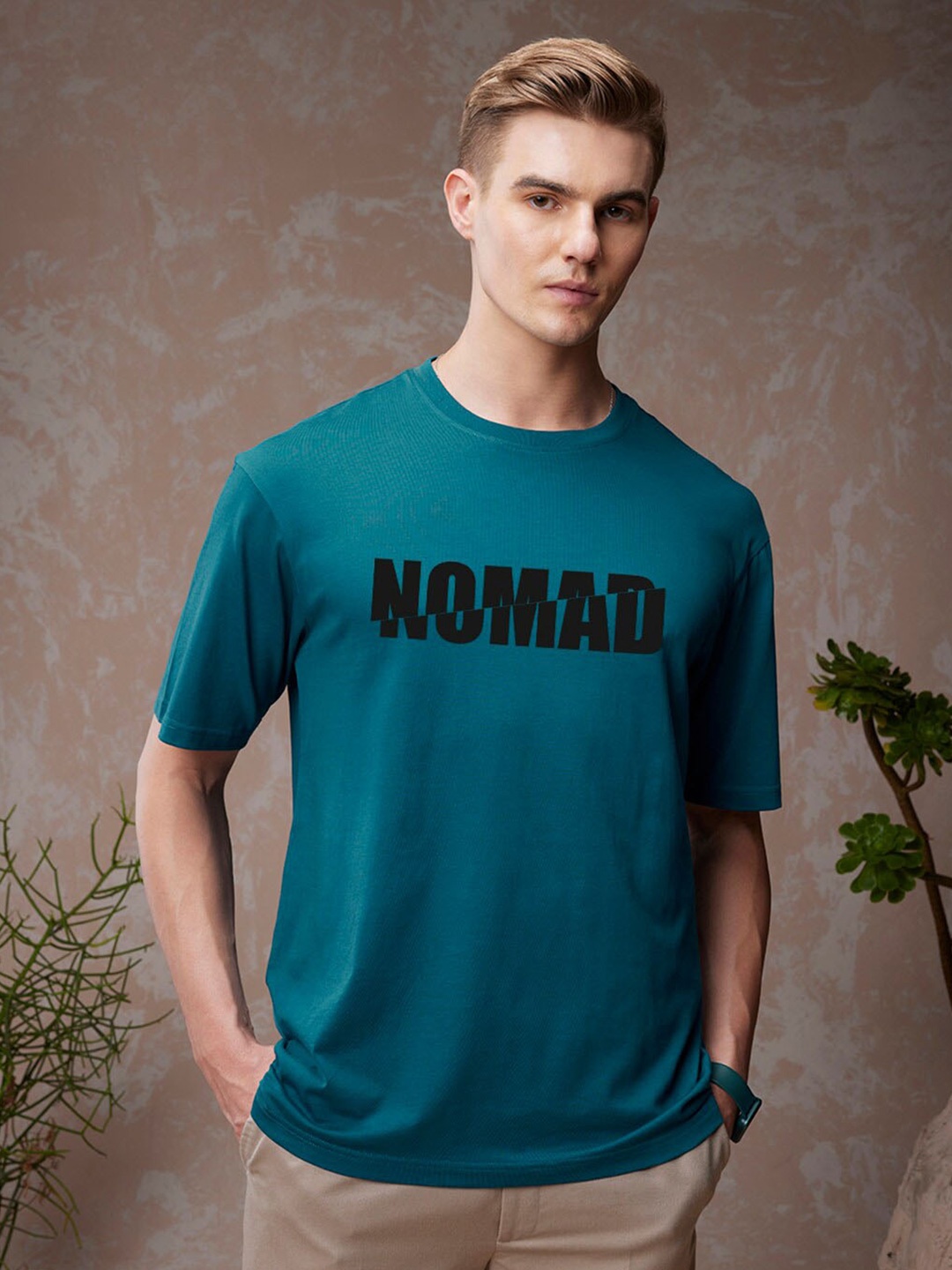 

Bewakoof Blue Typography Printed Round Neck Short Sleeves Cotton Oversized T-shirt