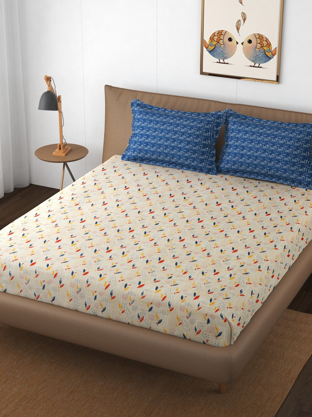 

Stuffique Beige & Blue Floral 144 TC King Bedsheet With 2 Pillow Covers