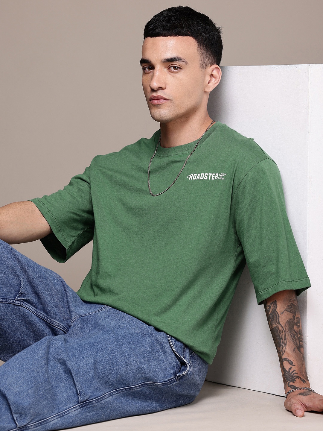 

The Roadster Life Co. Typography Printed Drop-Shoulder Pure Cotton Oversized T-shirt, Green