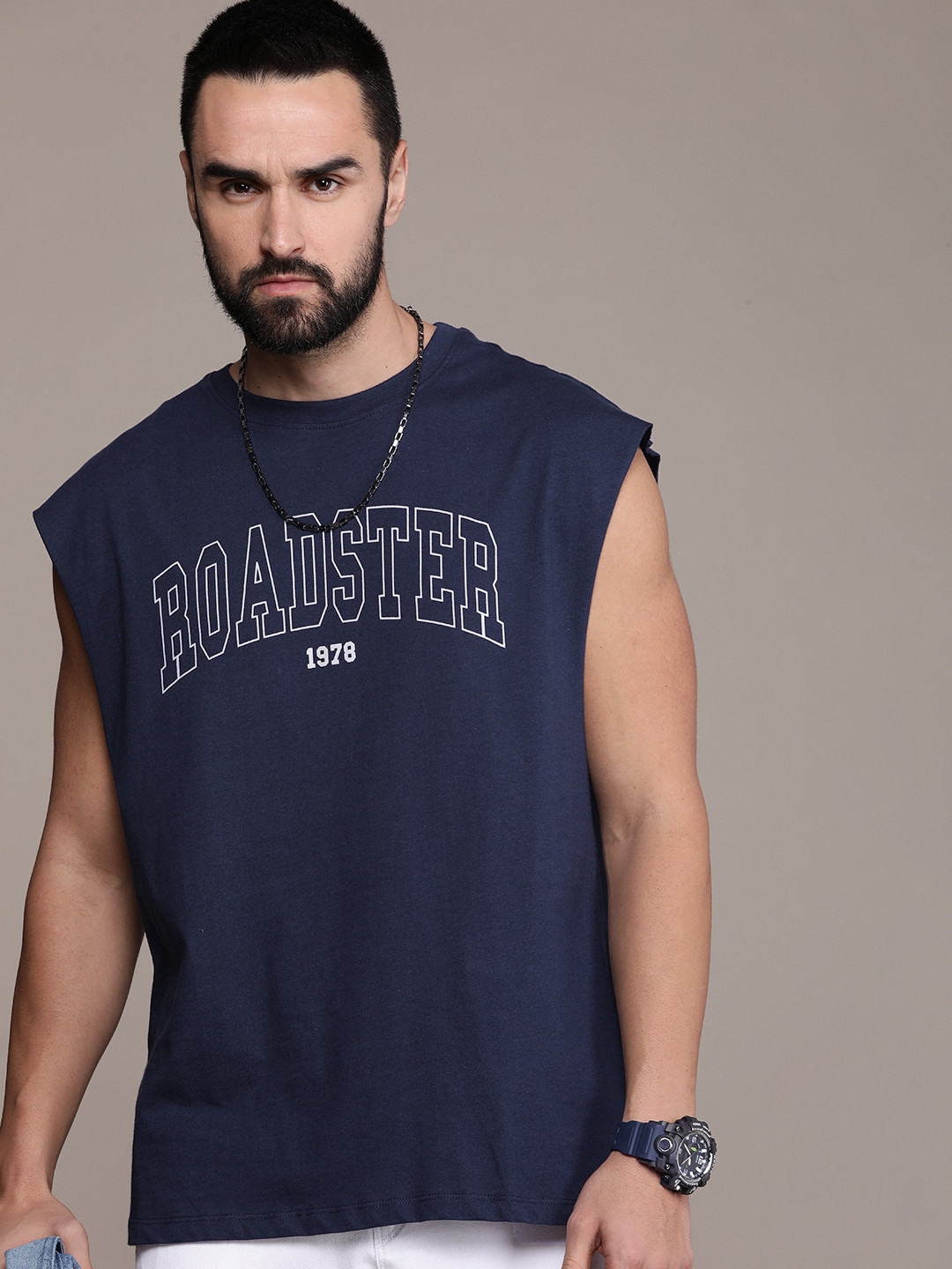 

Roadster Men Brand Logo Print Indigo Pure Cotton Relaxed Fit Sleeveless T-shirt, Navy blue