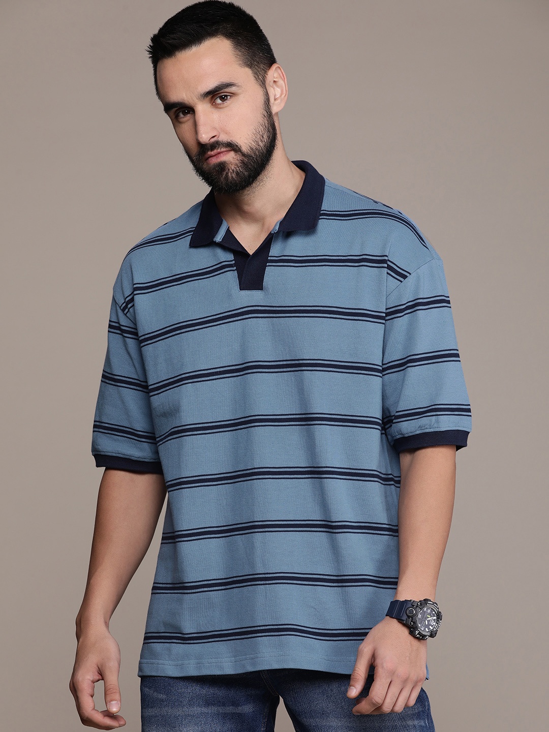 

The Roadster Lifestyle Co. Relaxed Fit Pure Cotton Striped Polo Collar Drop-Shoulder Sleeves T-shirt, Blue