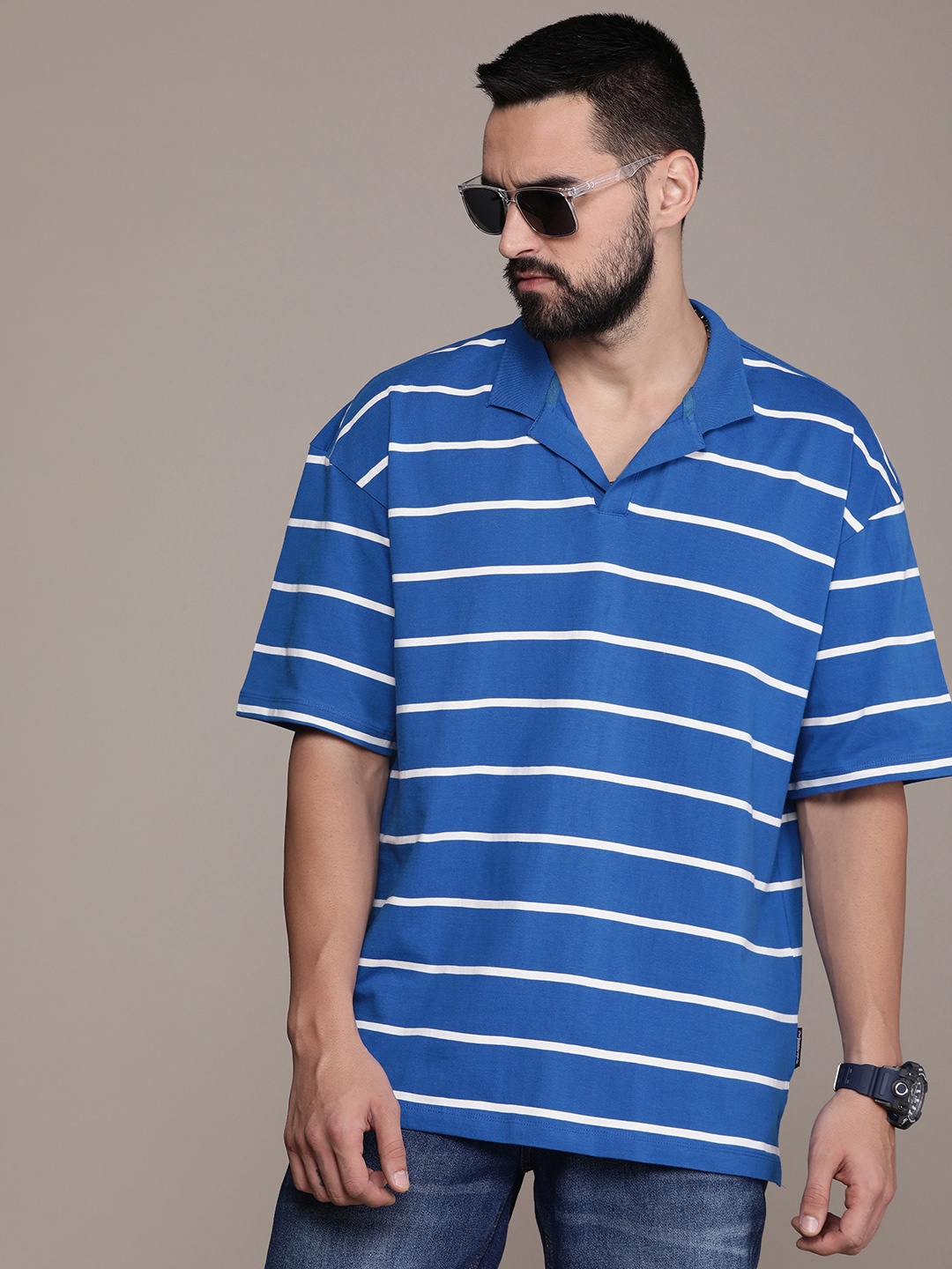 

The Roadster Lifestyle Co. Relaxed Fit Pure Cotton Striped Polo Collar Drop-Shoulder Sleeves T-shirt, Blue