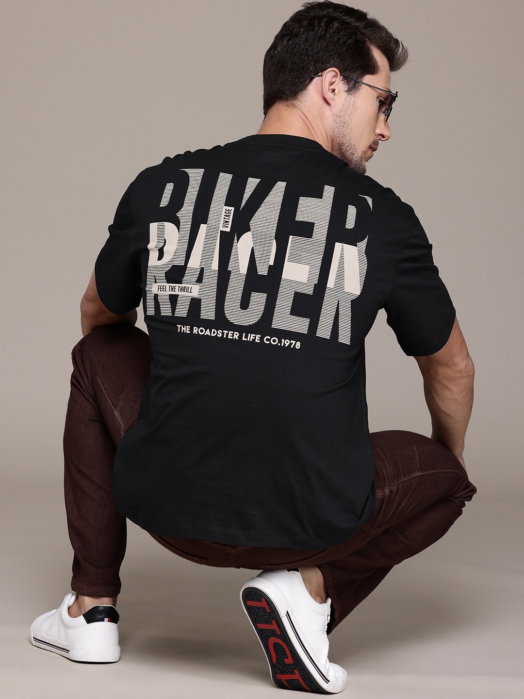 

The Roadster Lifestyle Co. Printed Drop-Shoulder Sleeves Pure Cotton T-shirt, Black
