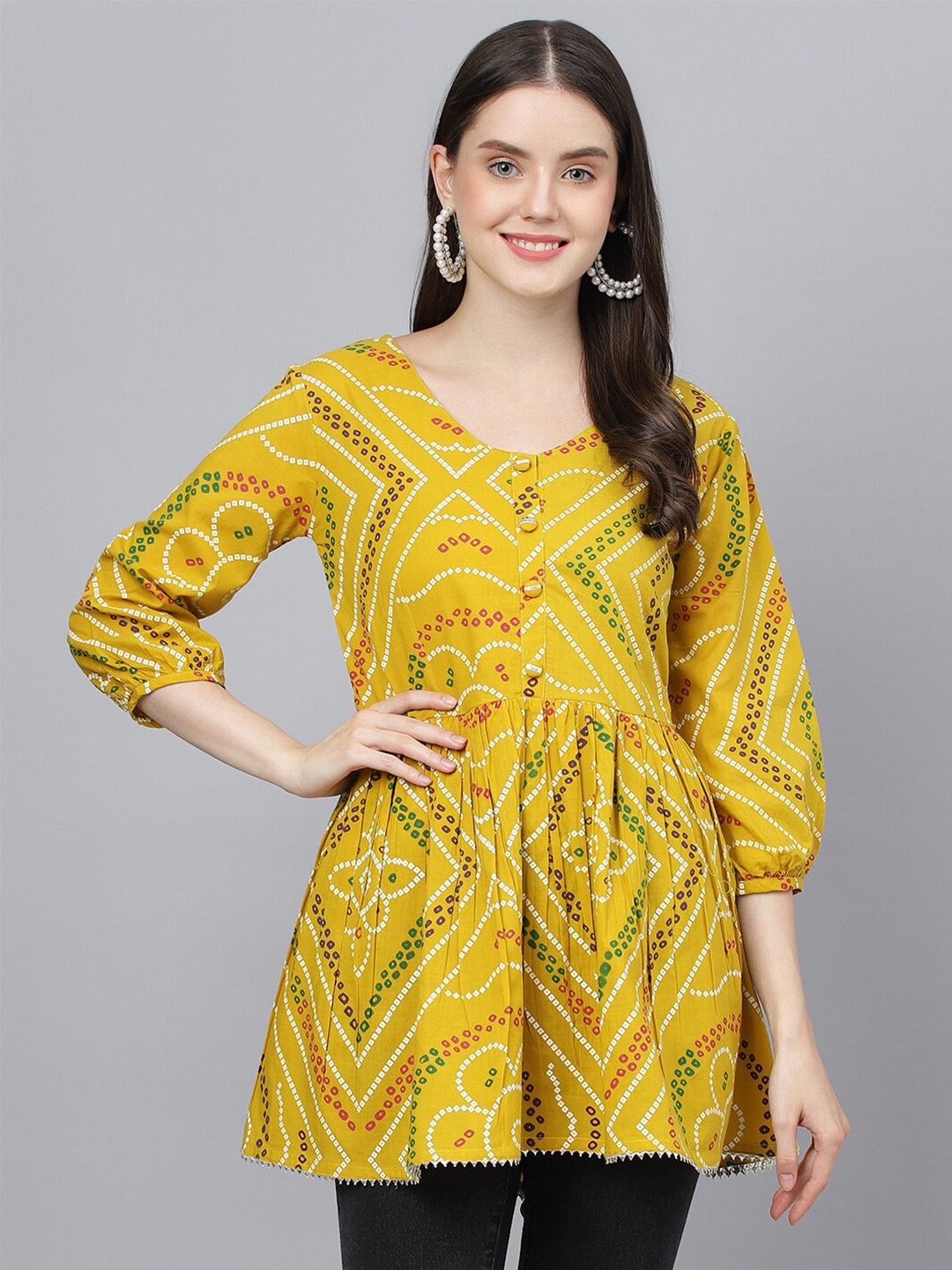 

KALINI Bandhani Printed Puffed Sleeves Pure Cotton Peplum Top, Mustard