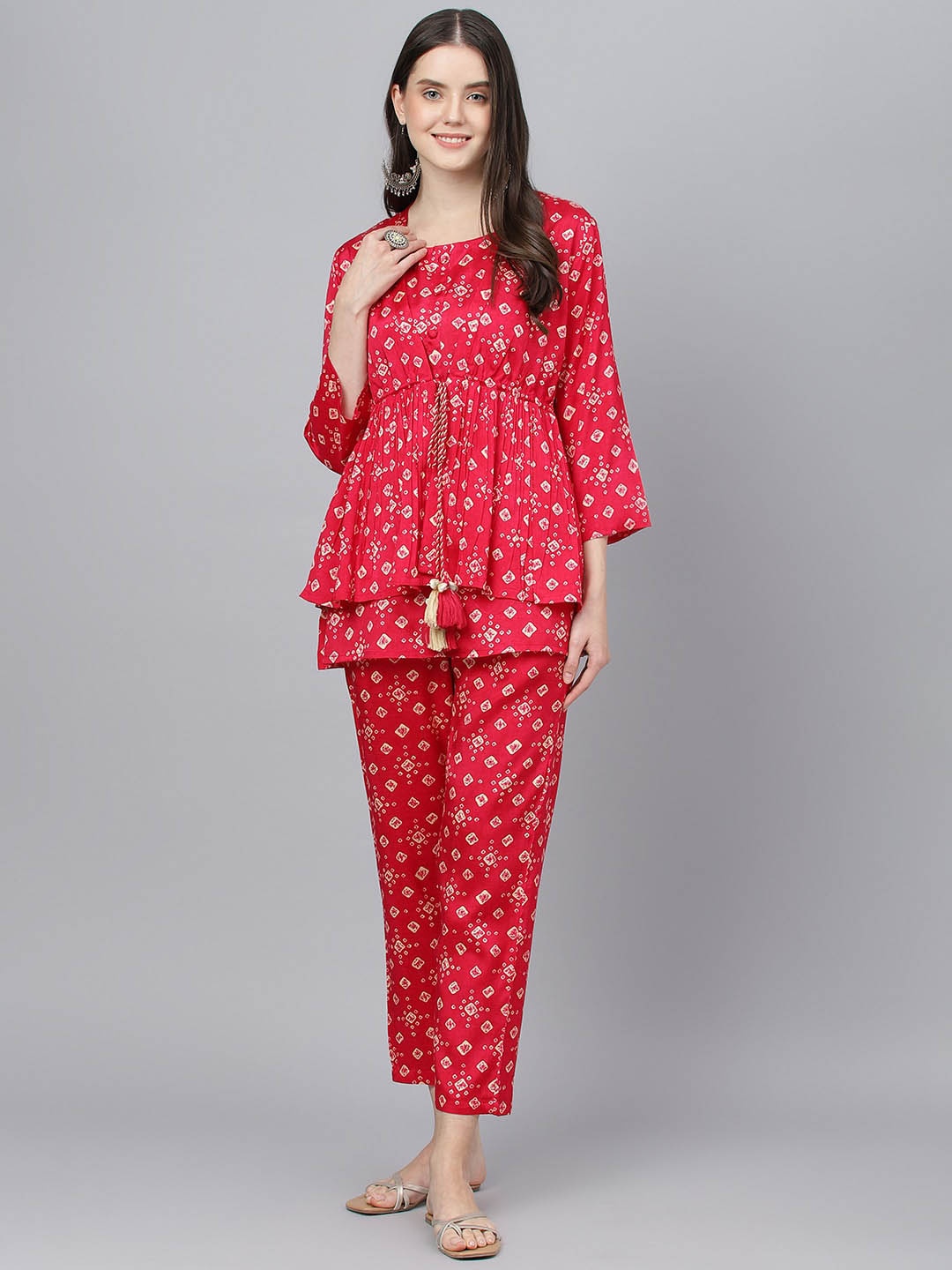 

KALINI Bandhani Printed Round Neck Sleeveless Top With Peplum Jacket & Trousers, Magenta