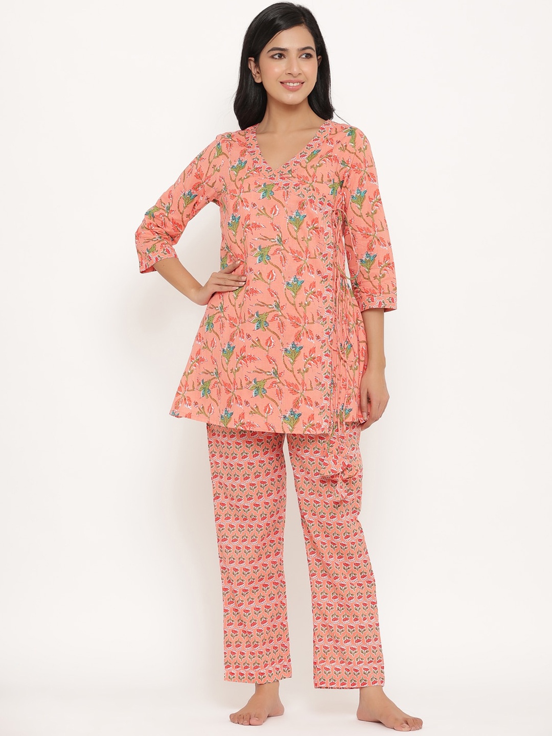 

Sangria Peach Floral Printed Pure Cotton Kurti With Trouser