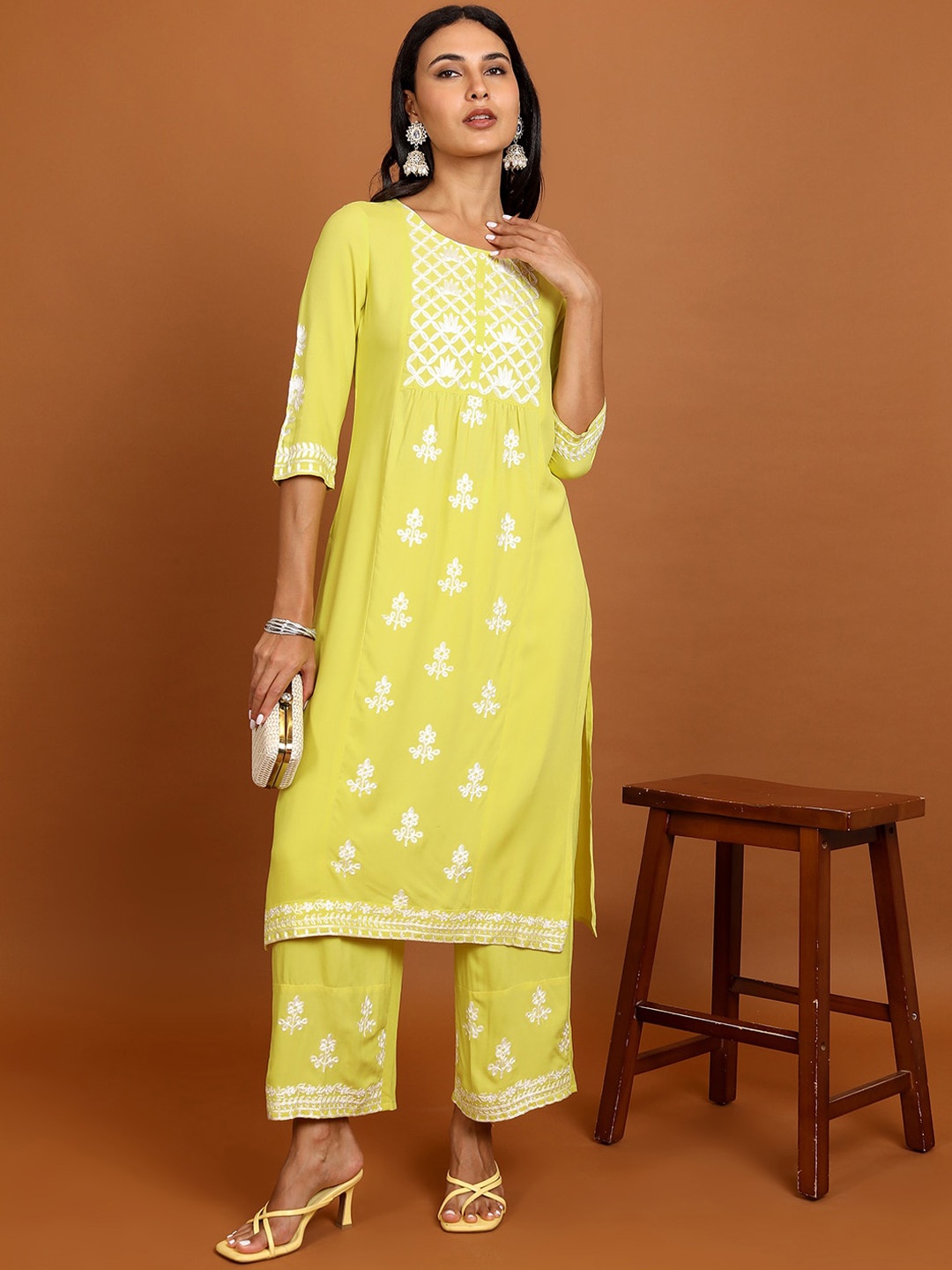 

Vishudh Yellow Floral Embroidered Straight Kurta with Palazzos