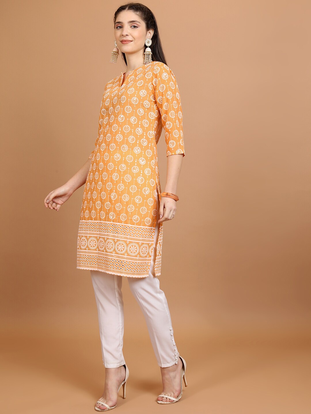 

Vishudh Ethnic Motifs Embroidered Three-Quarter Sleeve Straight Thread Work Kurta, Orange