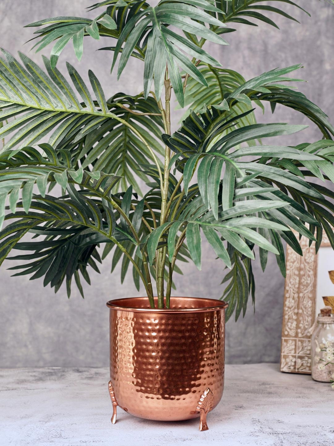 

BEHOMA Copper Toned Small Hammered Metal Planter With Leaf Leg