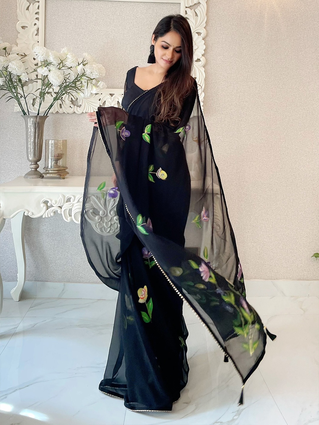 

Anouk Black & Black Floral Poly Georgette Designer Saree