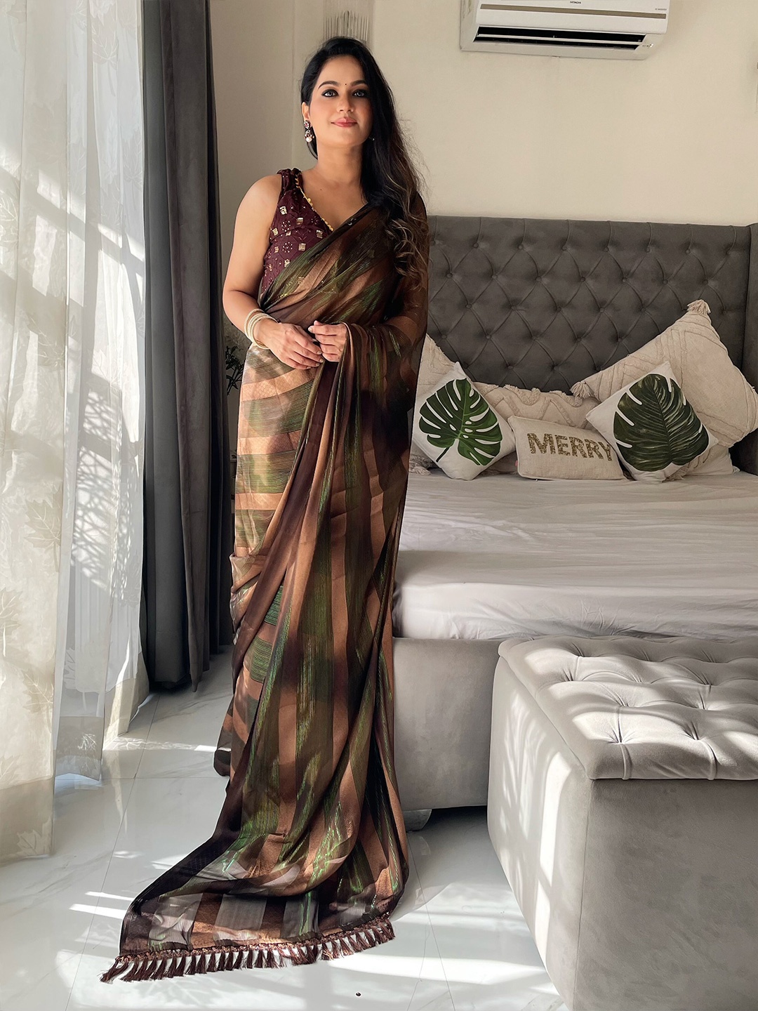 

Anouk Brown & Brown Striped Poly Georgette Saree