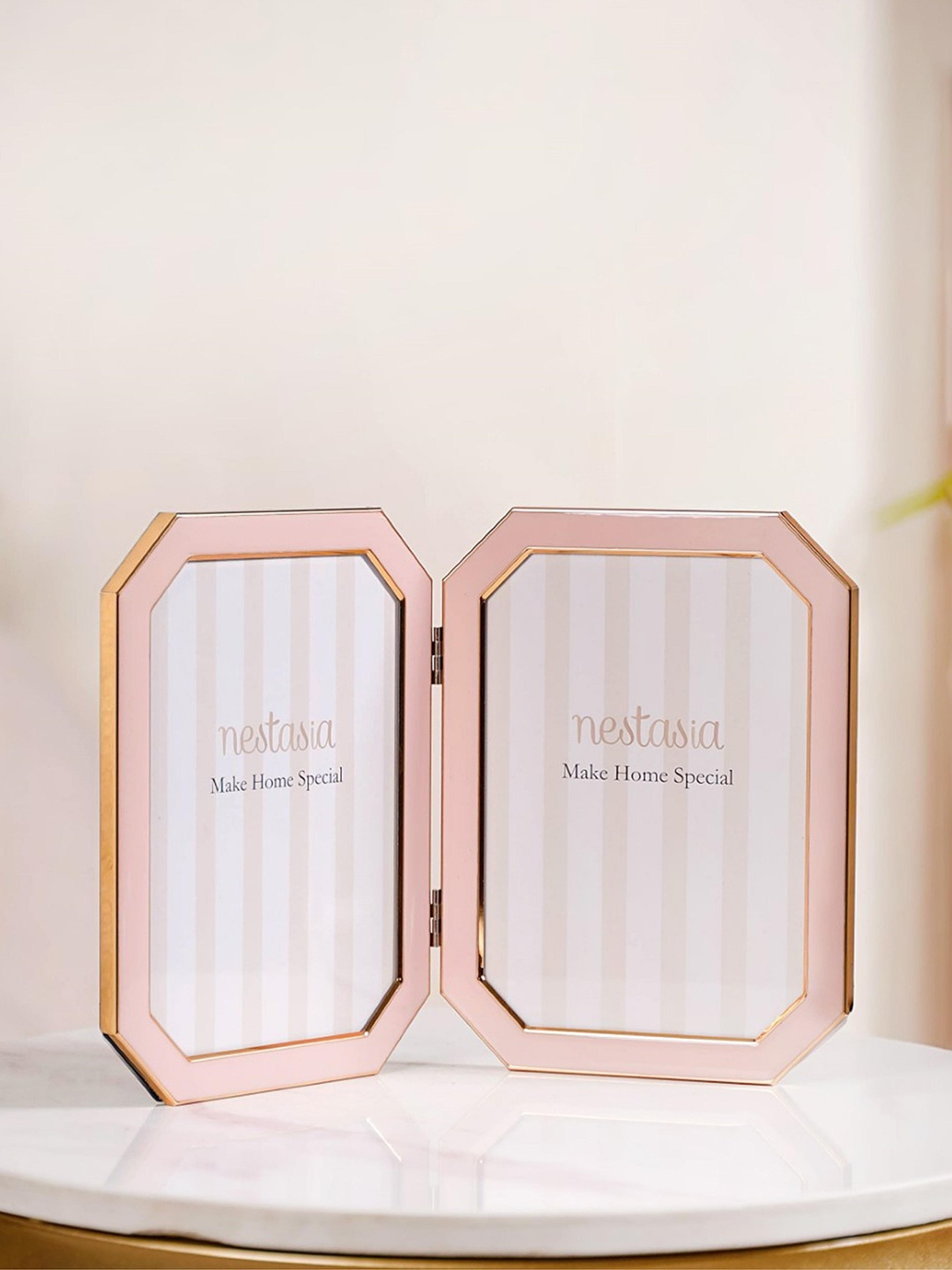 

Nestasia Pink & Gold Toned Metal Foldable Double Photo Frame