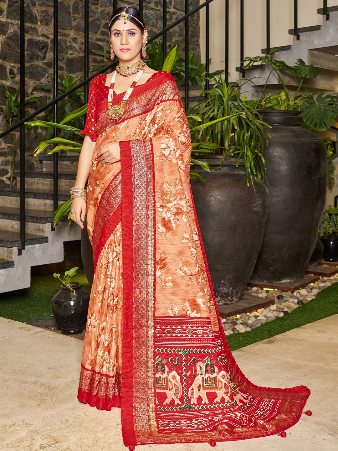 

Mitera Orange Embellished Silk Blend Designer Patola Saree