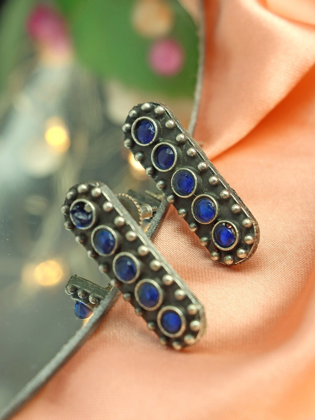 

Ozanoo Oxidised Silver Plated Stone Studded Drop Earrings