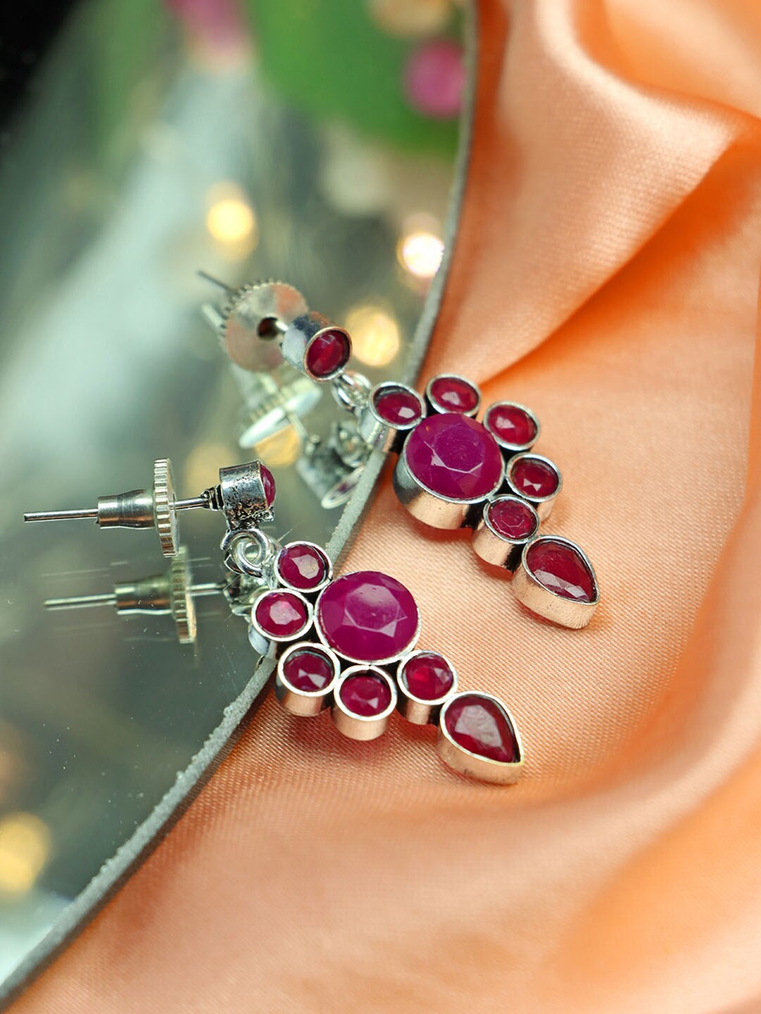 

Ozanoo Silver Plated Stone Studded Drop Earrings