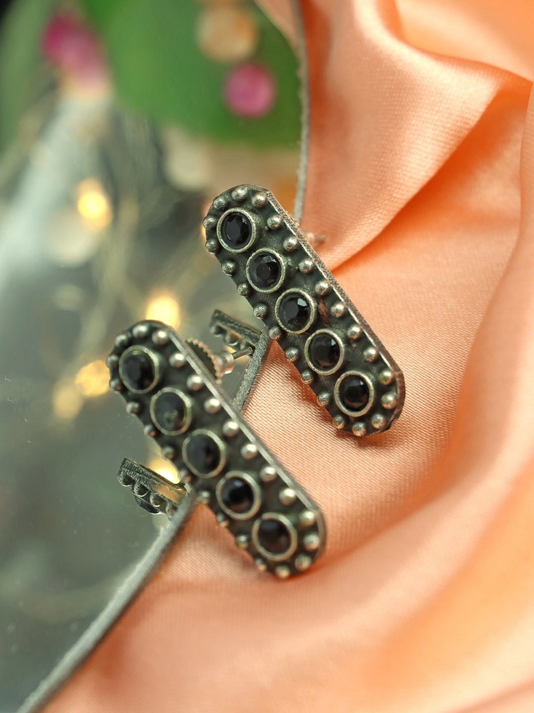 

Ozanoo Oxidised Silver Plated Stone Studded Drop Earrings