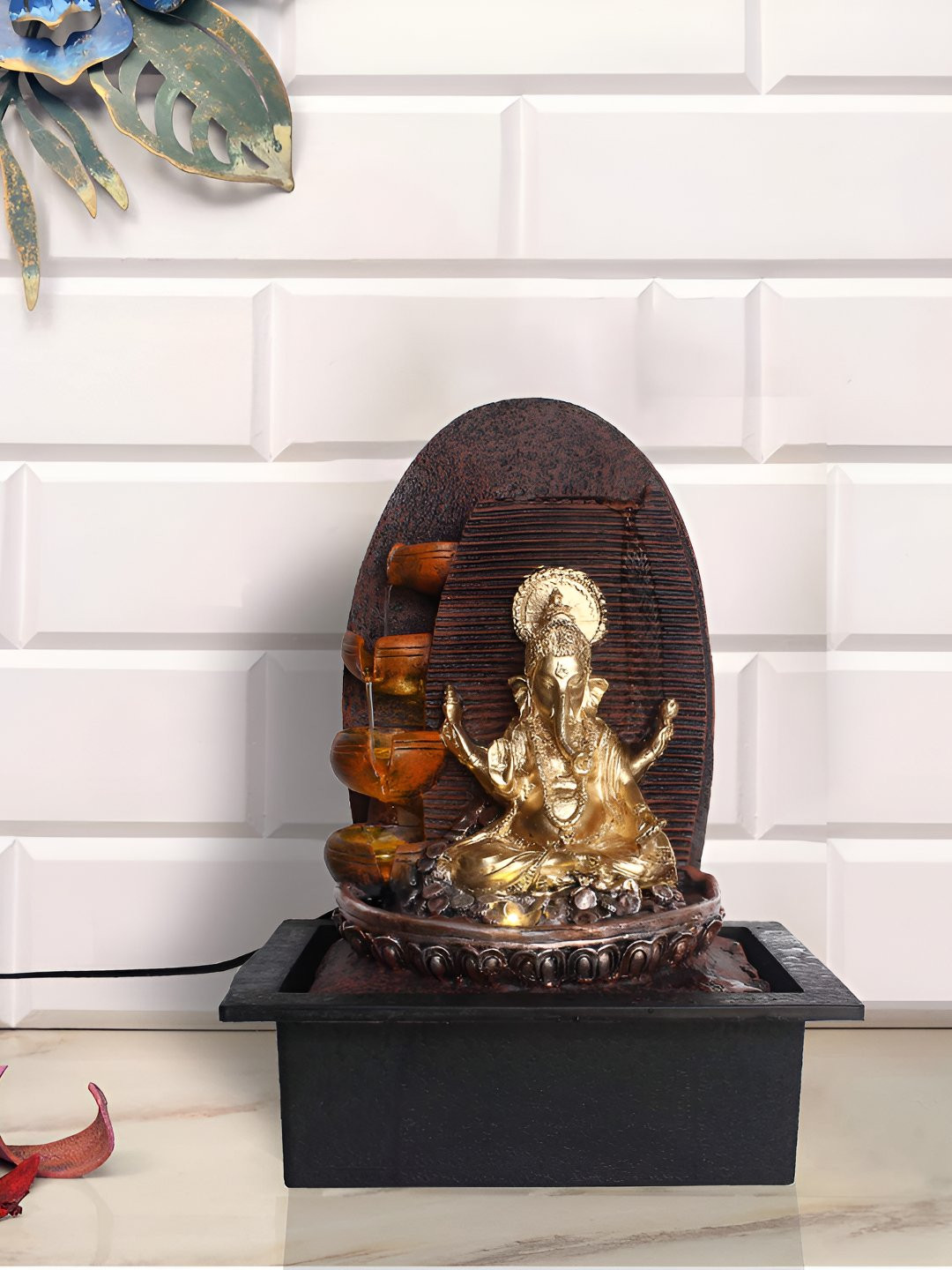 

Ancient Clock Makers Brown Power Operated Table Top Lord Ganesha Idol Water Fountain