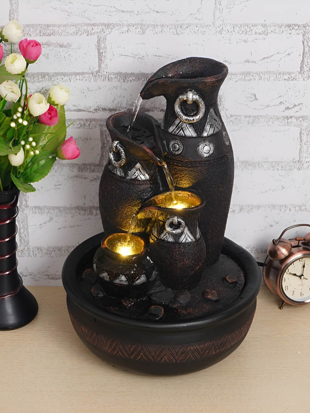 

Ancient Clock Makers Black Jug Style Table Top Water Fountain With LED light