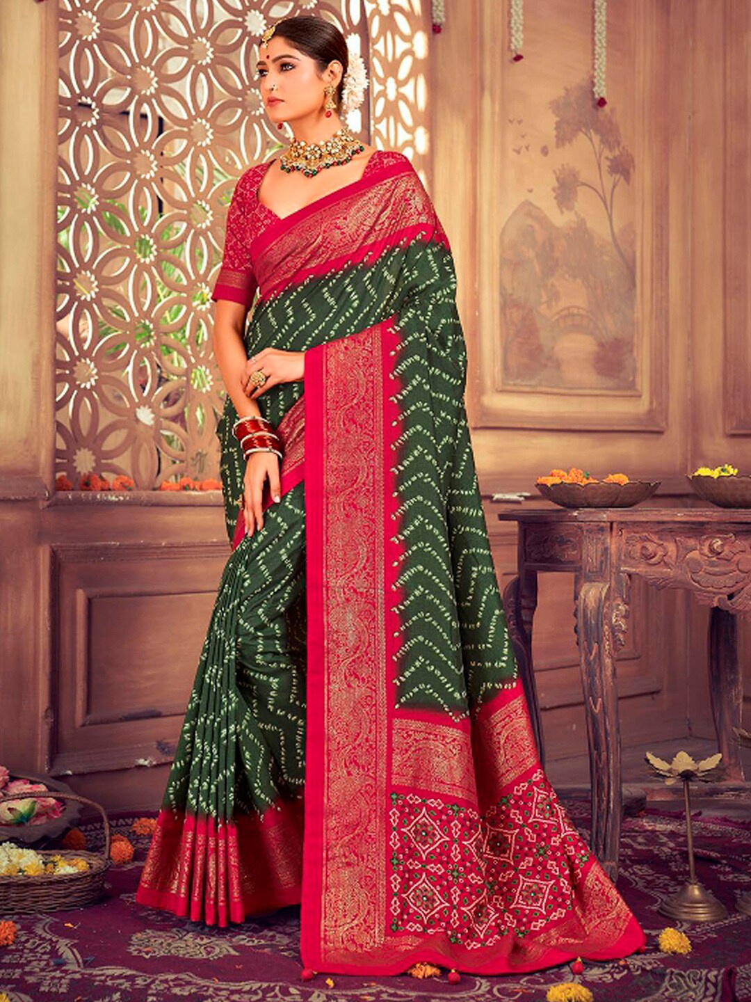 

Mitera Green Ethnic Motifs Printed Tussar Saree