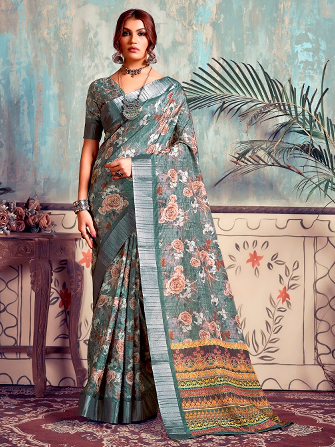 

Mitera Sea Green Floral Woven Design Zari Silk Blend Sungudi Saree