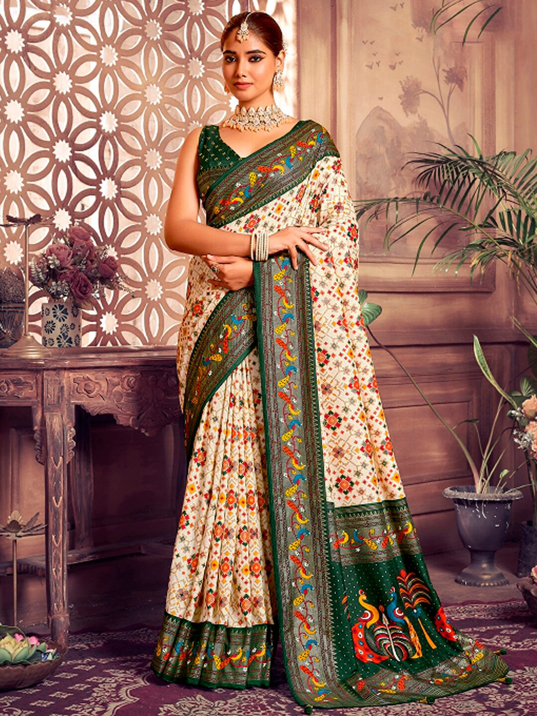 

Mitera Cream-Coloured & Green Ethnic Motifs Printed Zari Patola Saree