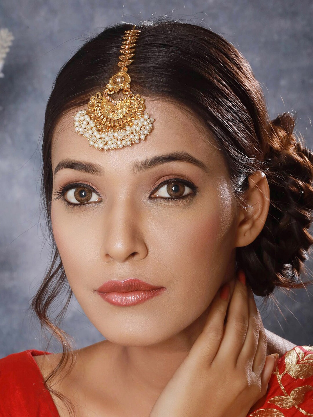 

Anouk Gold Plated Kundan Studded & Pearl Beaded Maang Tikka