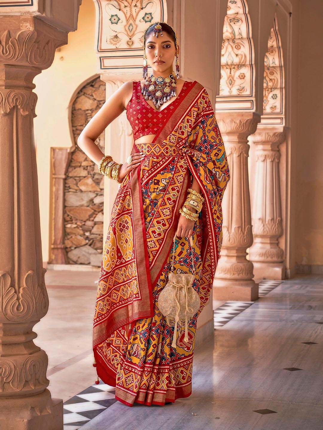 

elora Ethnic Motif Printed Patola Saree, Mustard