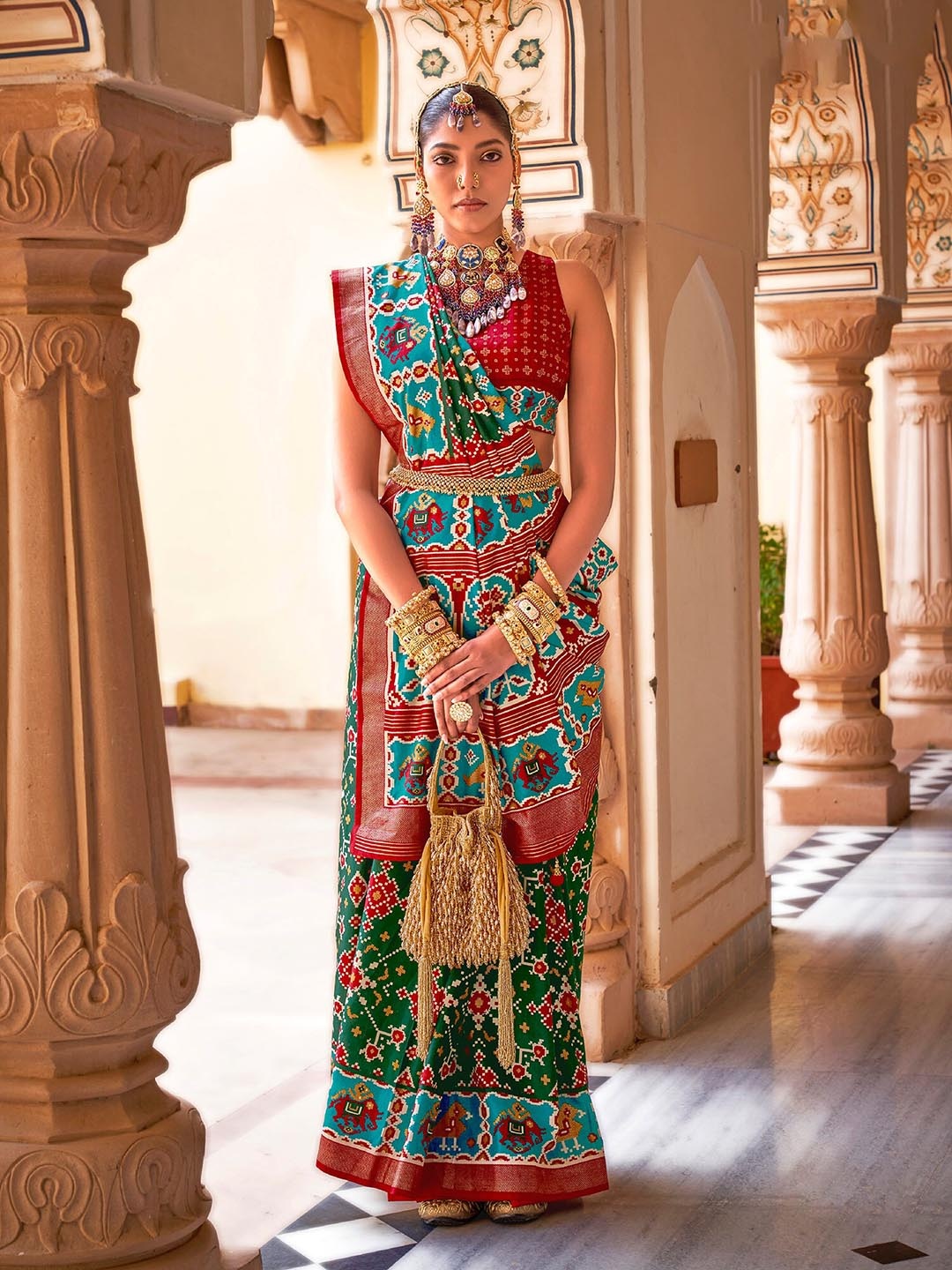 

elora Ethnic Motifs Printed Patola Saree, Green