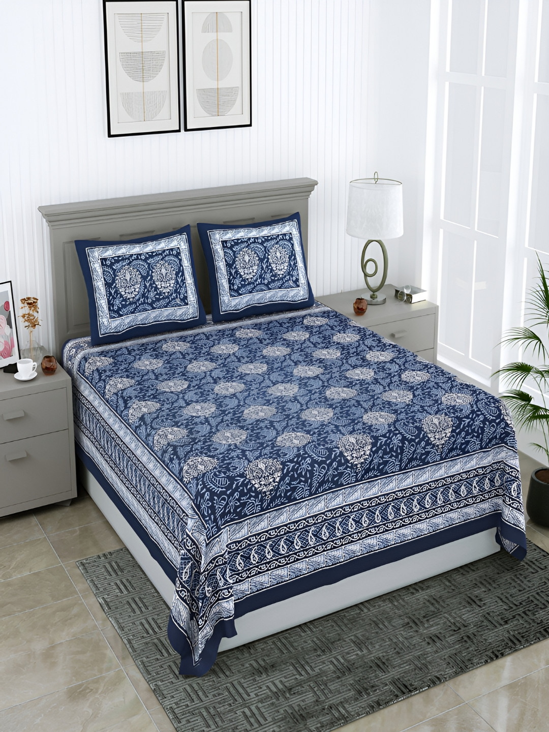 

Wayne Martin Navy Blue Ethnic Motifs Cotton 210 TC Queen Bedsheet With 2 Pillow Covers