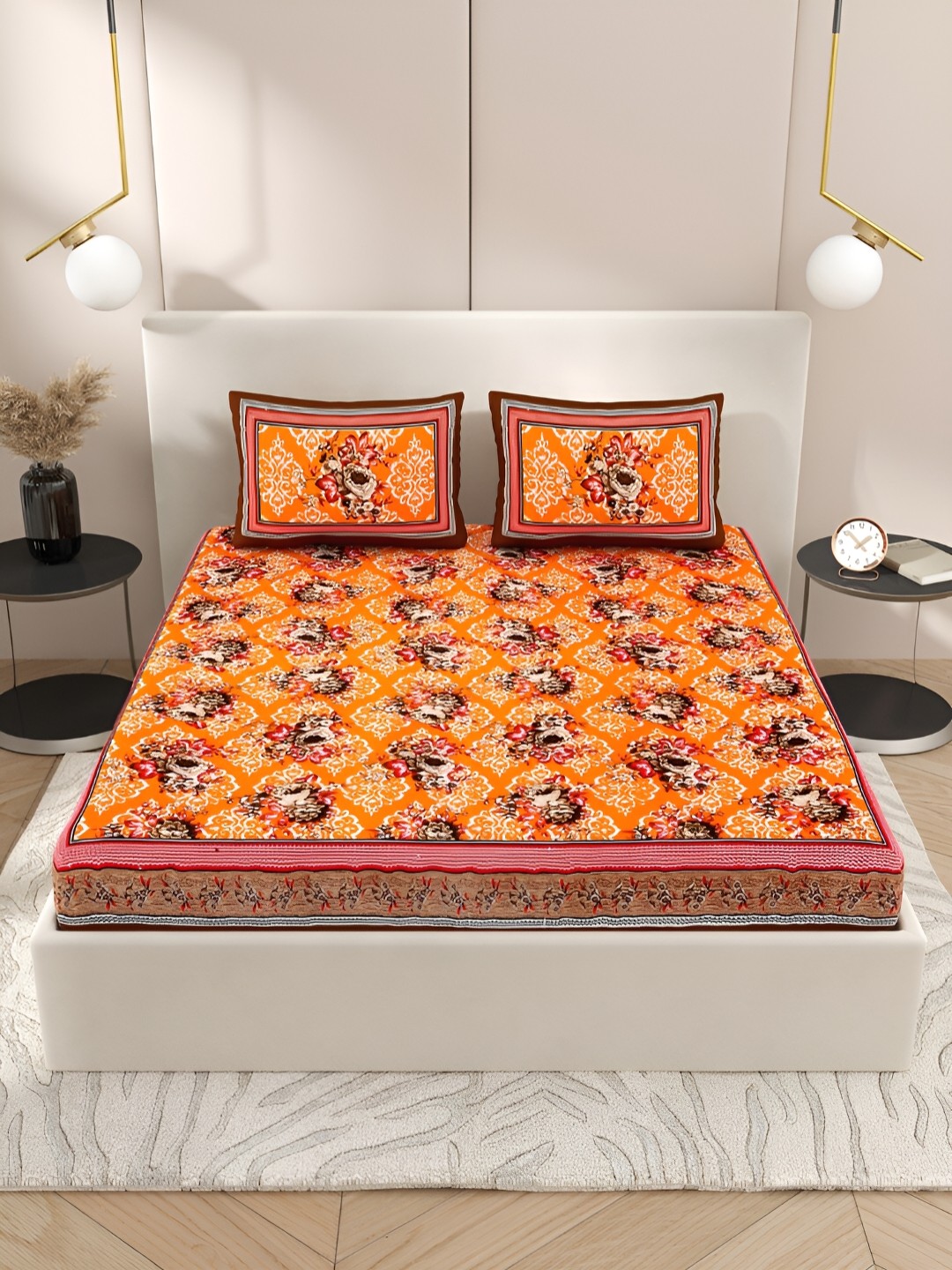 

Wayne Martin Orange & Brown Floral Cotton 210 TC Queen Bedsheet With 2 Pillow Covers