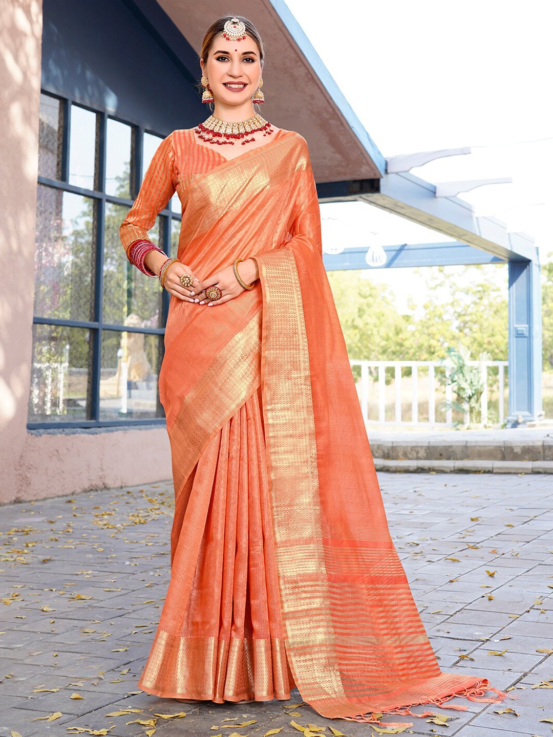 

Anouk Rustic Orange Solid Zari Organza Saree