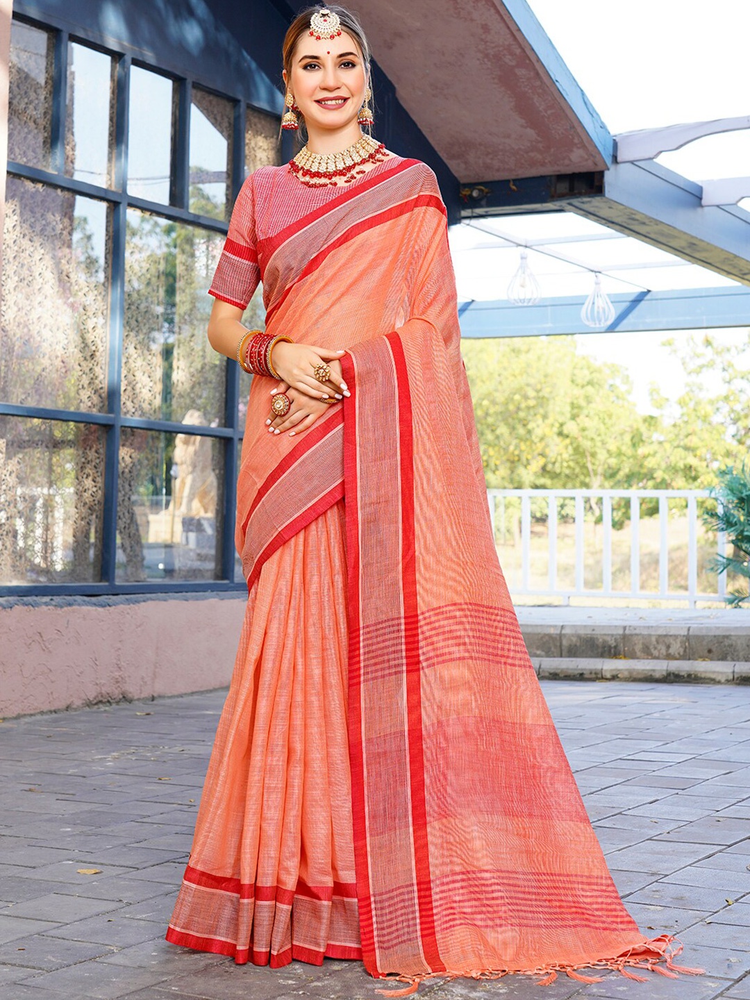 

Anouk Orange Solid Linen Weaving Saree