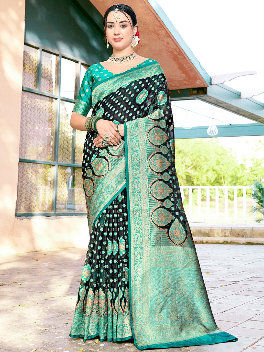 

Anouk Turquoise Blue Ethnic Motifs Woven Design Organza Saree