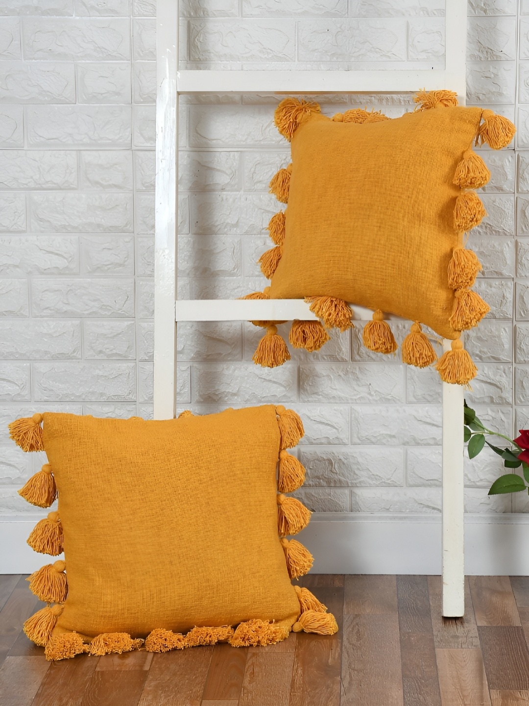 

HOMADORN Boho Mustard 2 Pieces Cotton Square Cushion Covers With Tassels