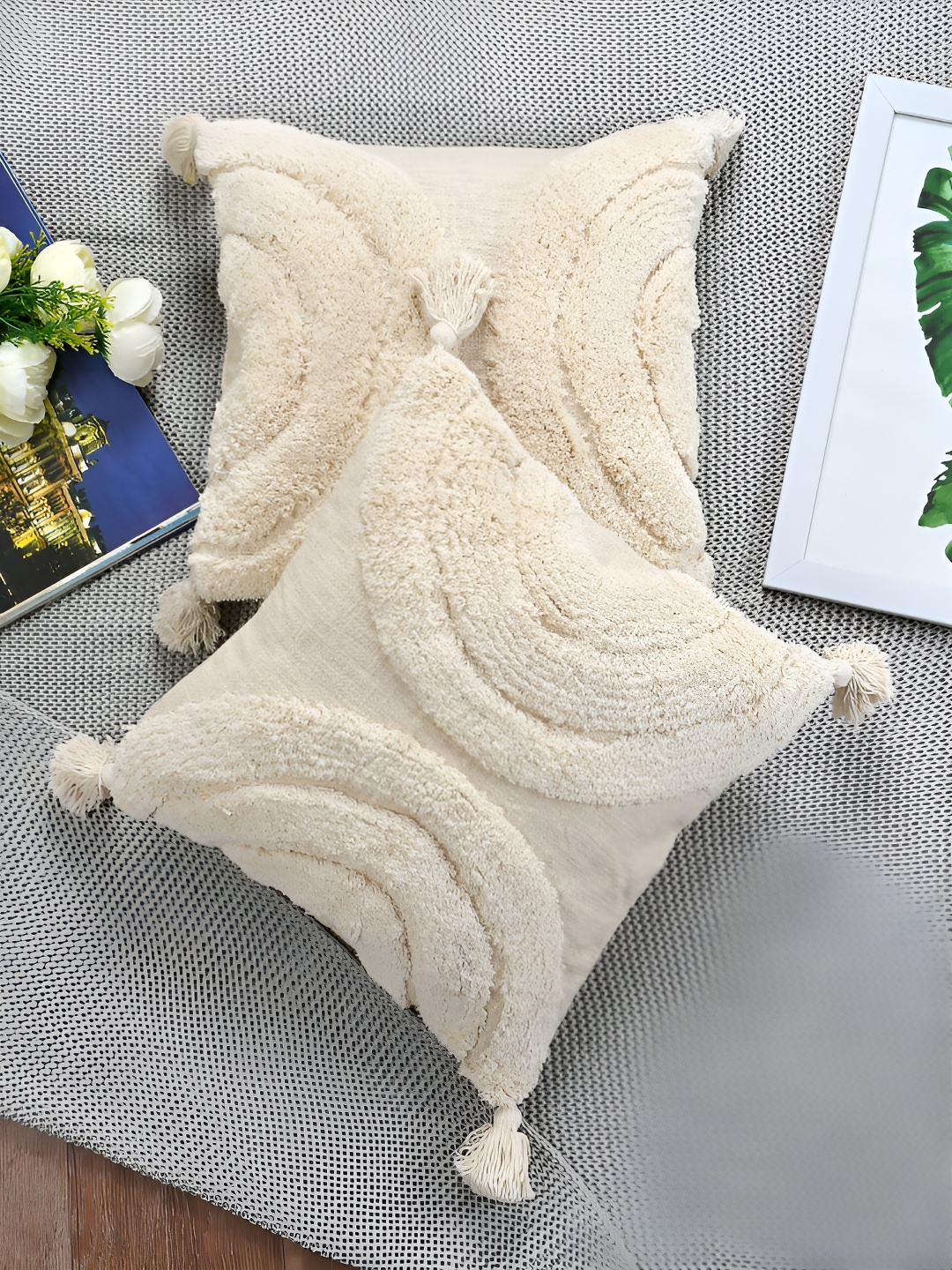 

HOMADORN Off White 2 Pieces Self Design Cotton Square Cushion Covers with Tassels