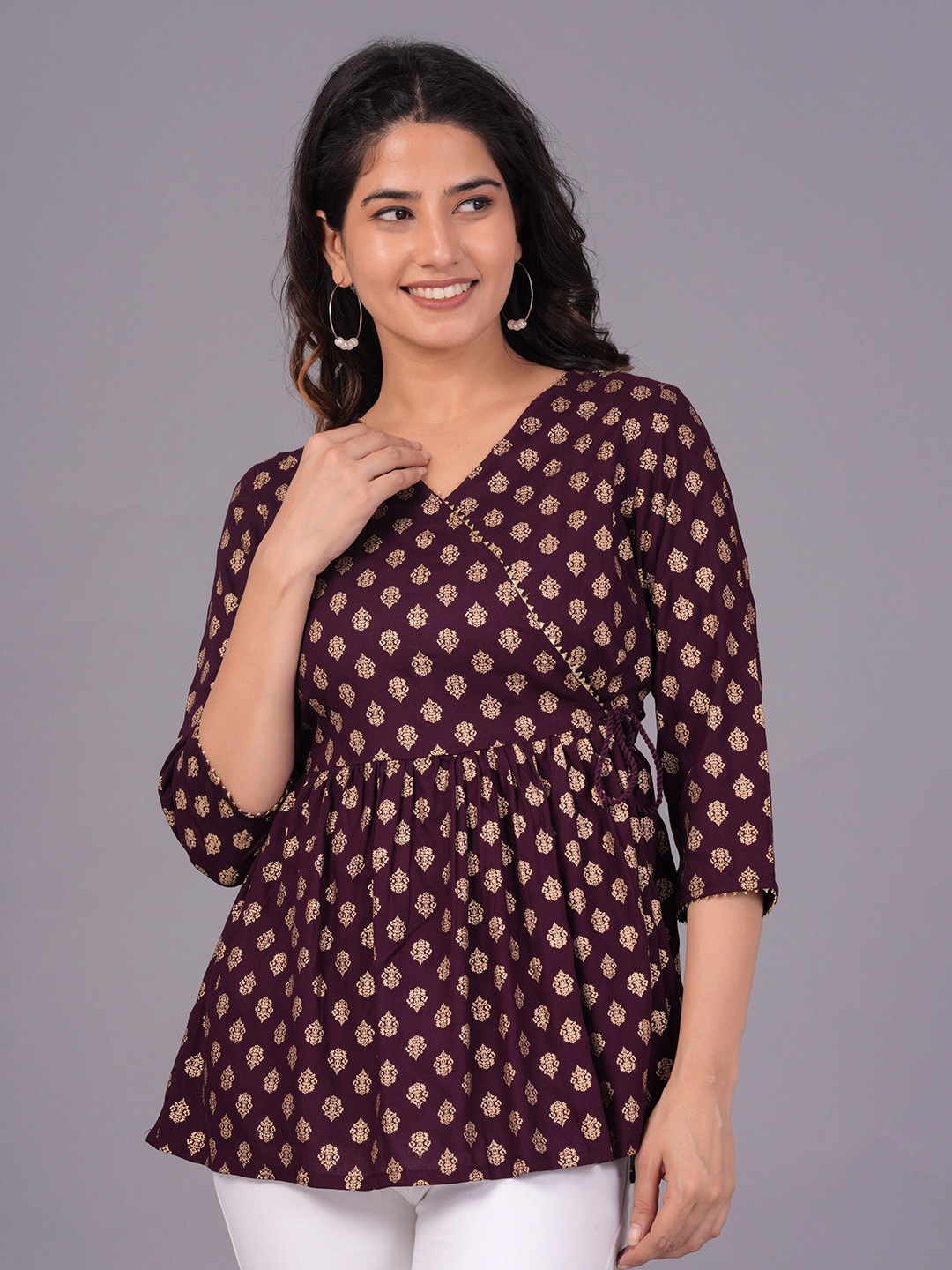 

The Kurta Express Ethnic Motifs Printed V-Neck Gathers Detail Tunic, Maroon