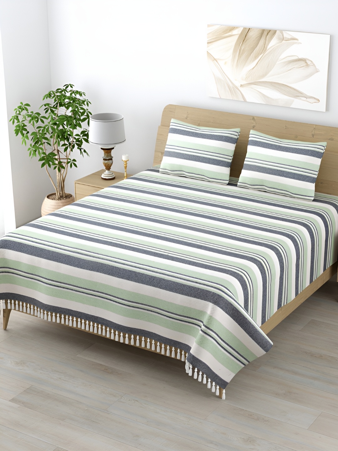 

Homez Sparrow Green & White Striped Cotton 210 TC King Bedsheet with 2 Pillow Covers