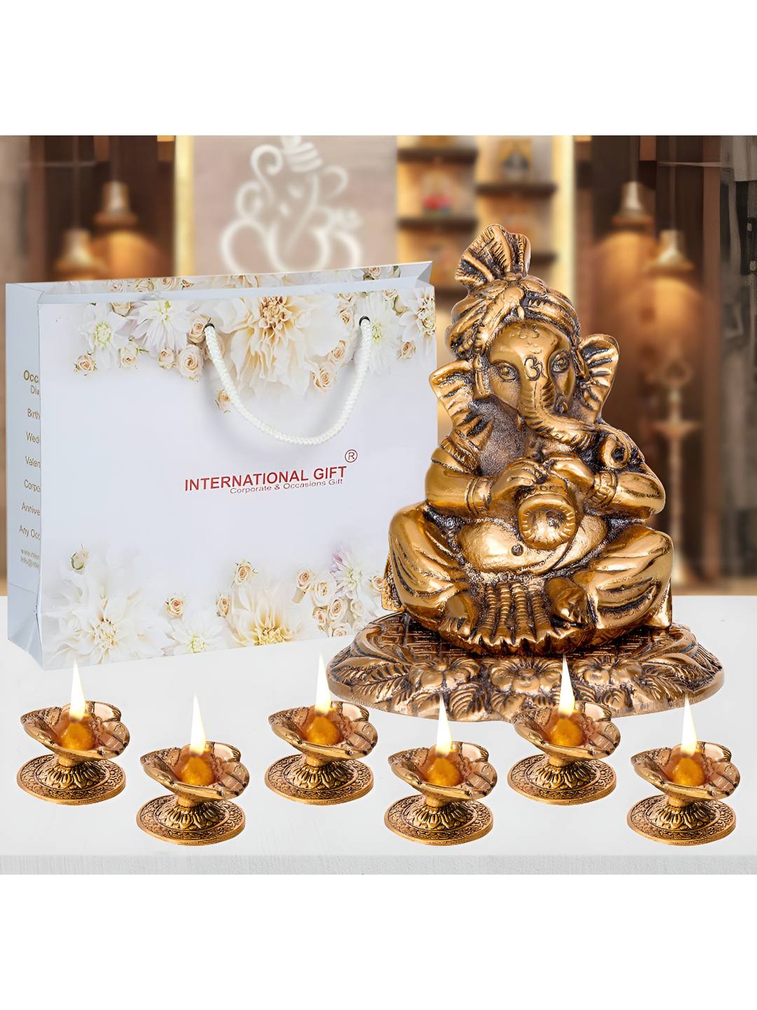 

INTERNATIONAL GIFT Brown Brass Ganesha Statue & 6 Pieces Diyas Home Gift Set