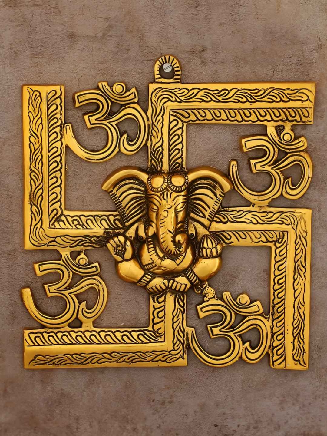 

INTERNATIONAL GIFT Gold Toned Swastik Ganesha Ji Wall Hanging