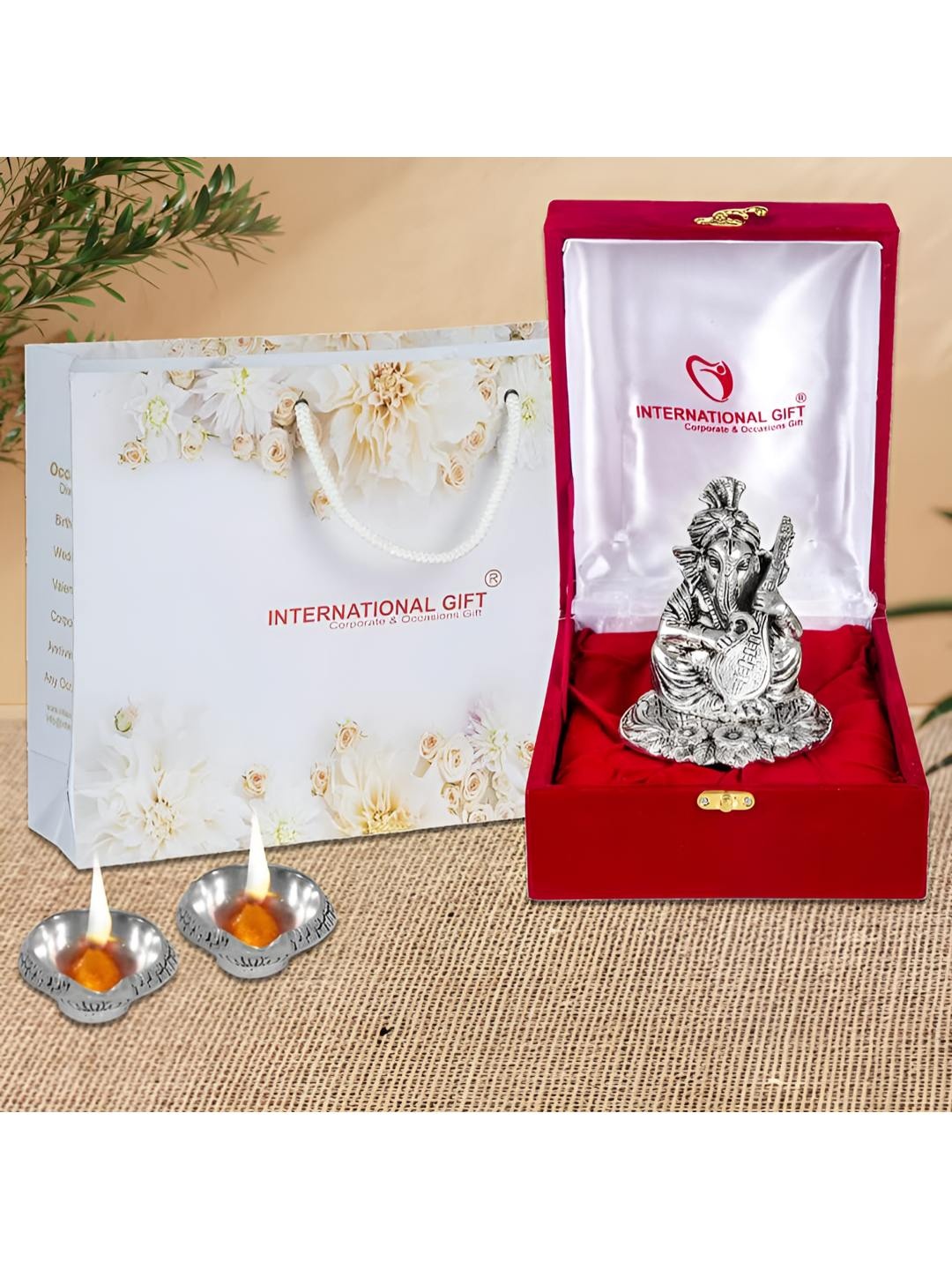 

INTERNATIONAL GIFT Set of 3 Grey Ganesh Idol With Designer Diya With Beautiful Red Box, Silver