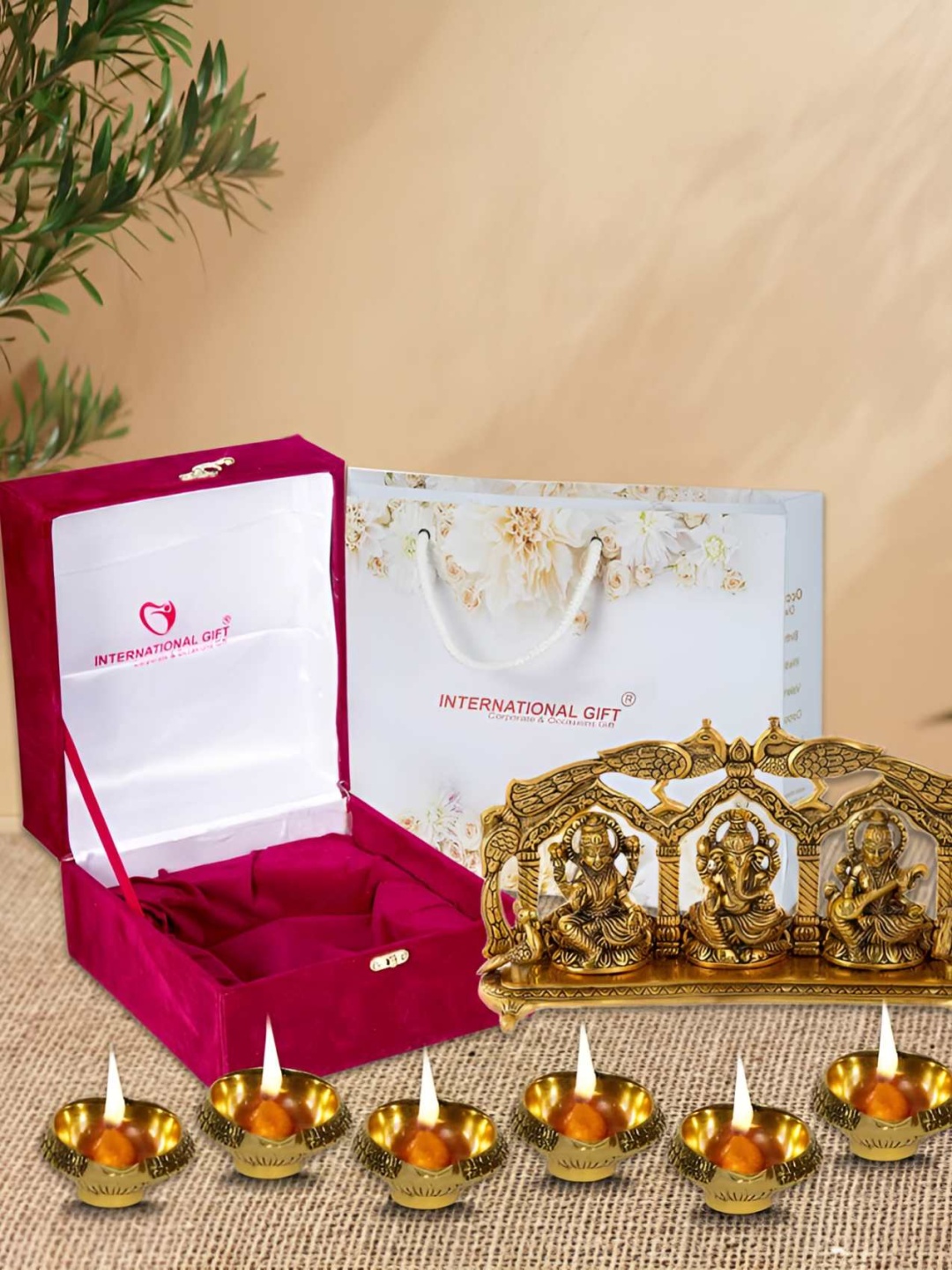 

INTERNATIONAL GIFT Gold Plated Laxmi Ganesh Saraswati Idol & 6 Pieces Diyas Home Gift Set