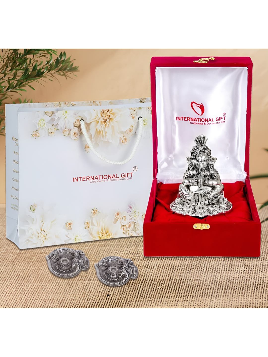 

INTERNATIONAL GIFT White Textured Ganesh Idol With Om Diya, Silver