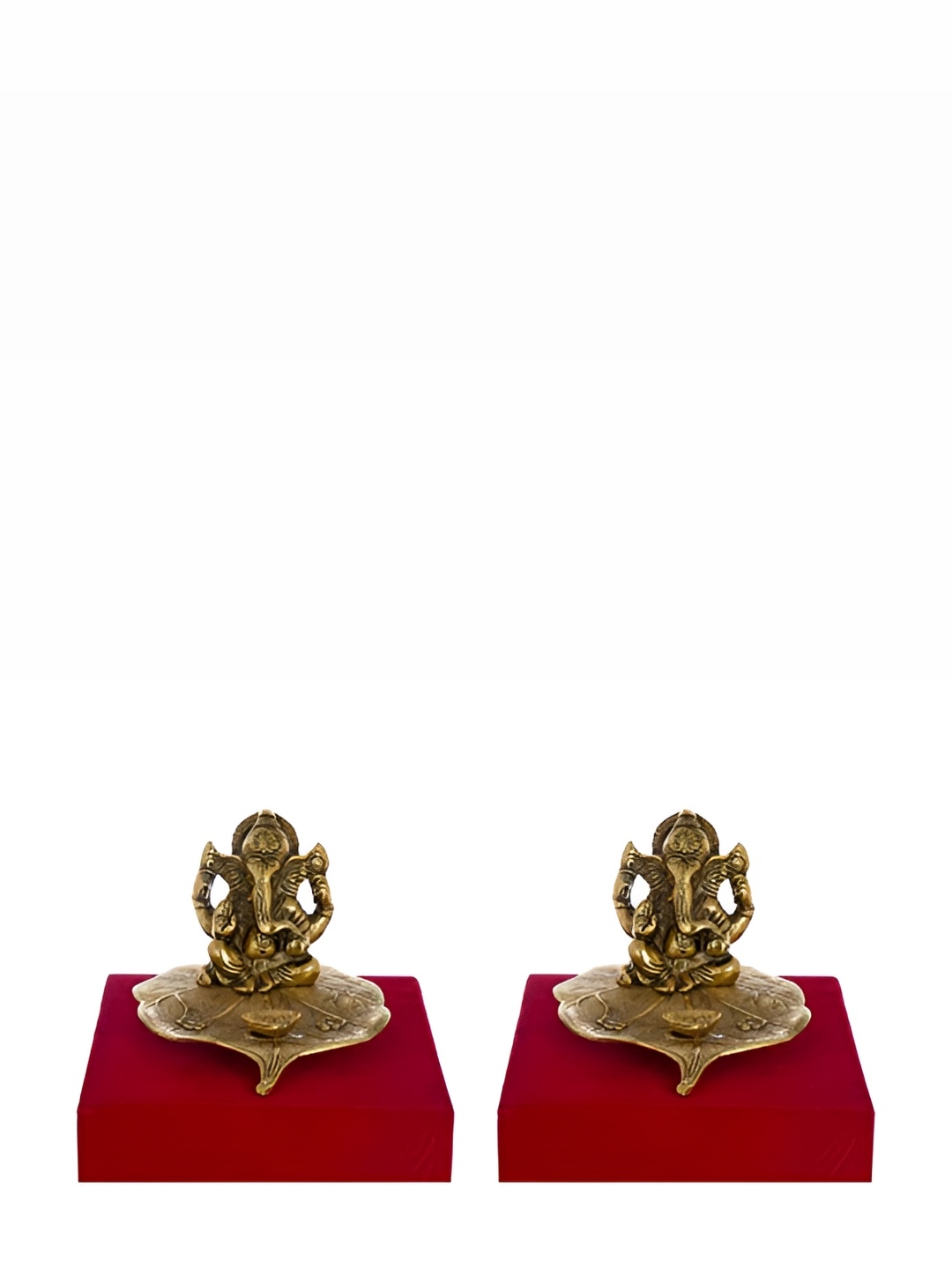 

INTERNATIONAL GIFT Gold Toned Ganesha Sitting On Leaf Idol With Diya & Box
