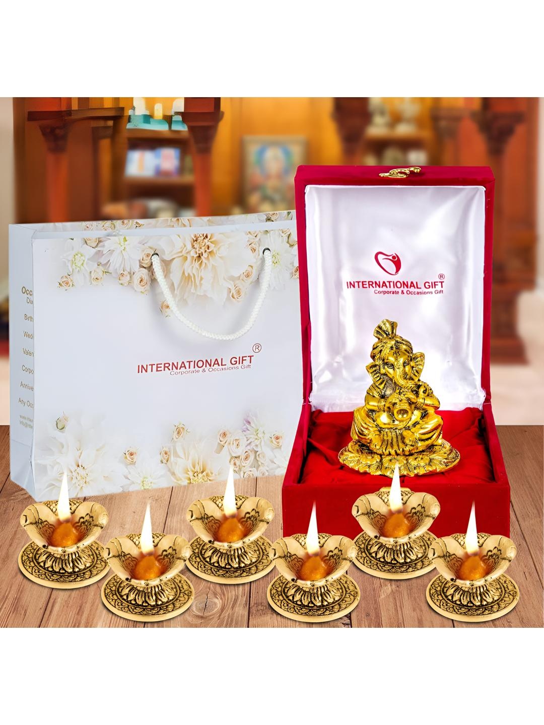 

INTERNATIONAL GIFT Gold Tone Ganesh Idol With Shehanais With Beautiful Gift Box