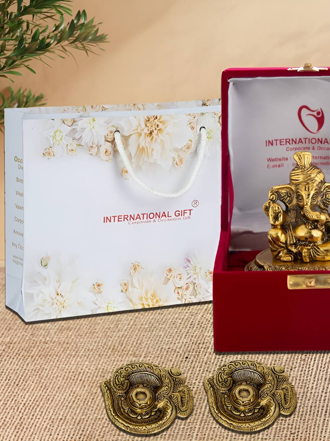 

INTERNATIONAL GIFT Gold-Plated Ganesh Idol With Om Diya Home Gift Set