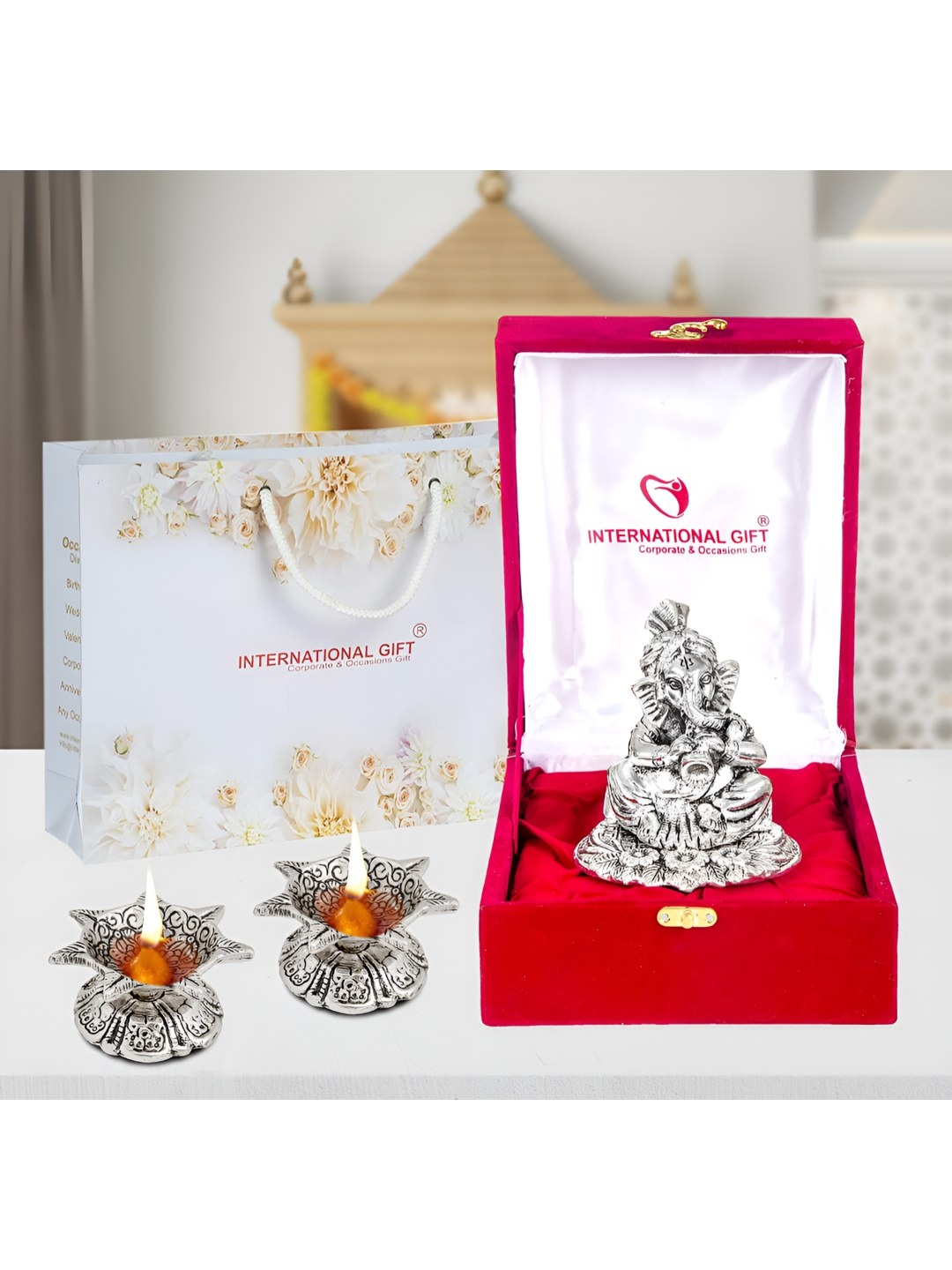

INTERNATIONAL GIFT Silver-Toned Ganesh With Shehanais Idol & Diya Gift Set