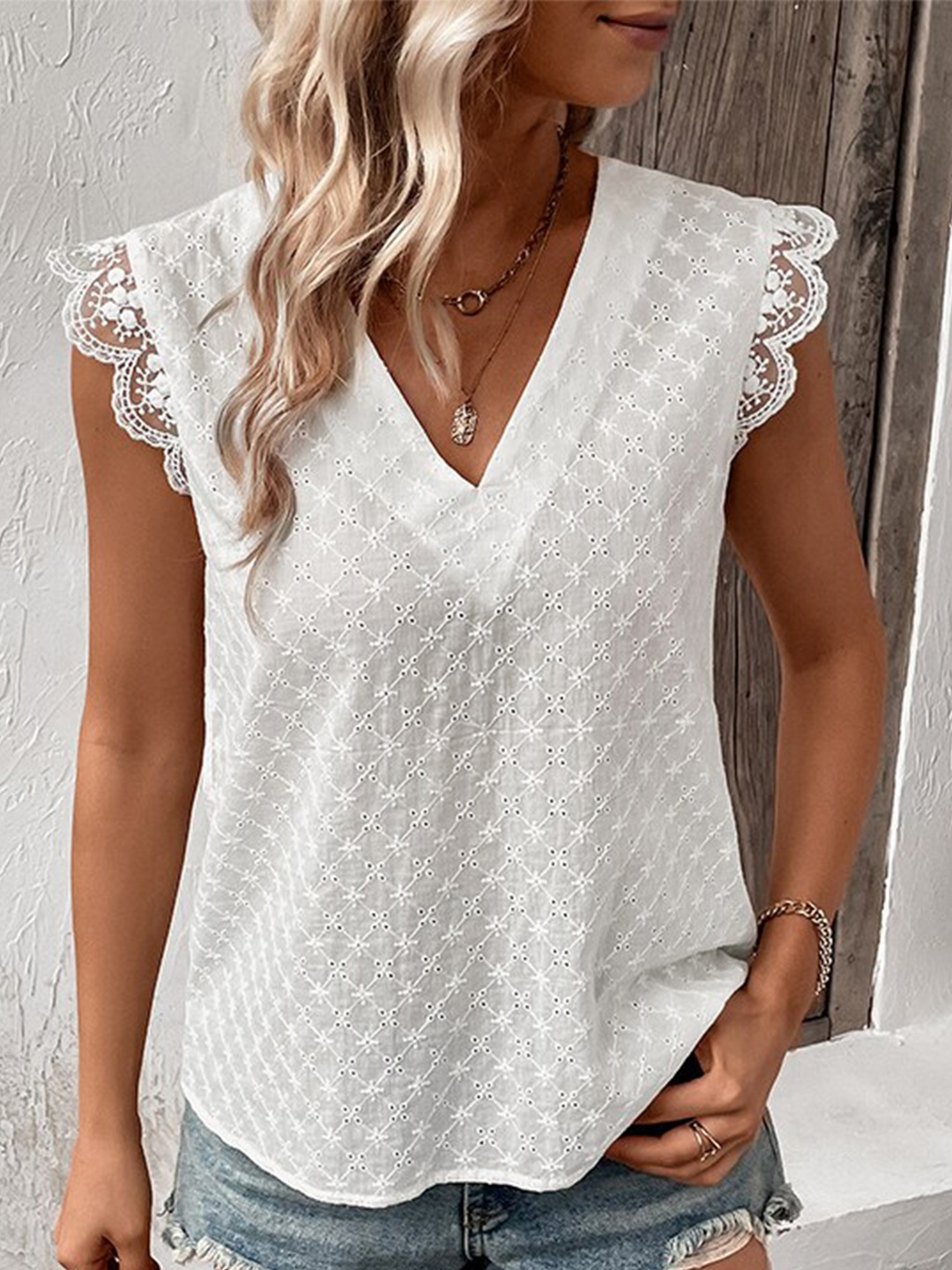 

StyleCast White Self Design Lace Inserts Styled Back Top