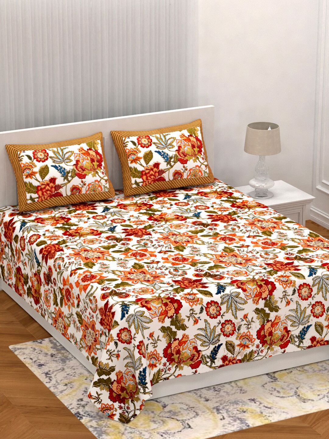 

Qfab White & Mustard Floral Cotton 144 TC King Bedsheet With 2 Pillow Covers