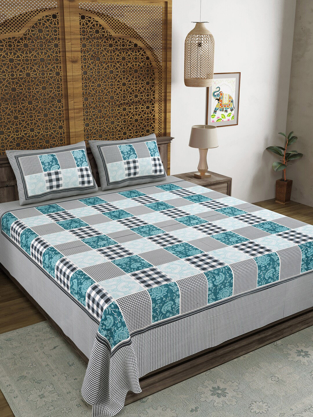 

Aura Blue & Black Geometric Printed 120 TC Queen Bedsheet with 2 Pillow Covers